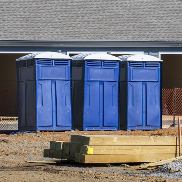 what is the cost difference between standard and deluxe portable restroom rentals in Pemberwick